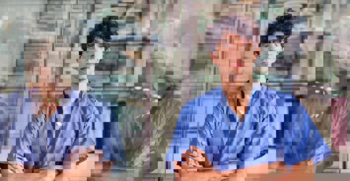 Junior doctor with arms folded